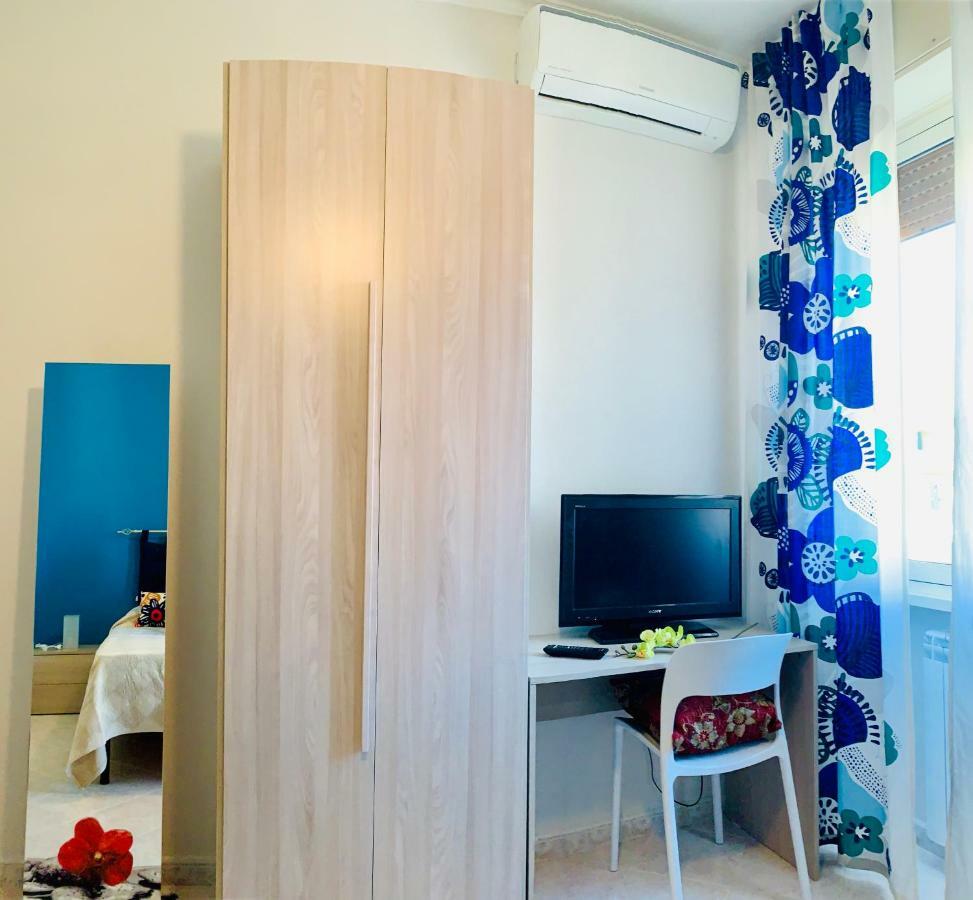 Camera Matrimoniale/Doppia con Letti Singoli con Bagno in Comune